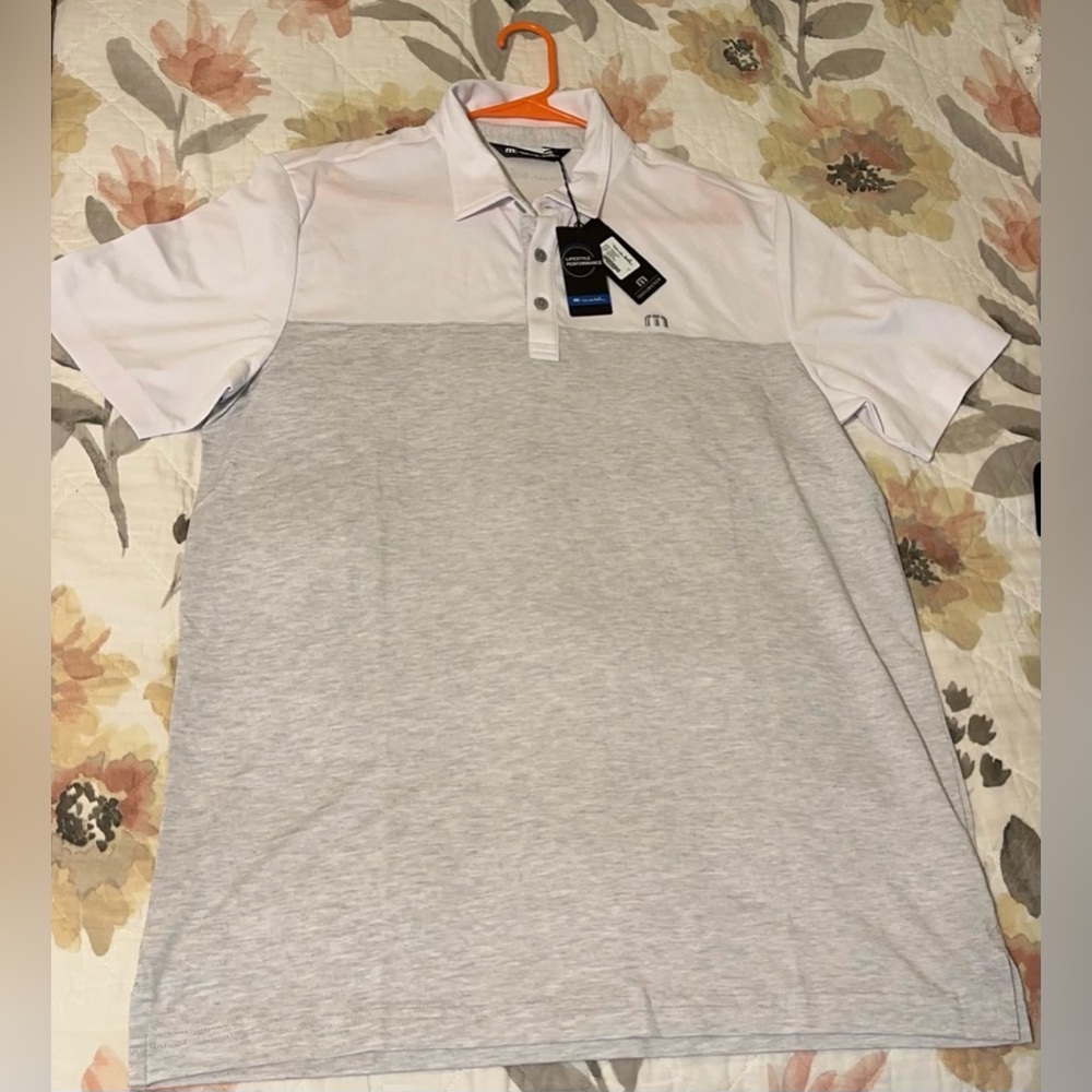 Lifestyle performance Travis Mathews white and grey collared shirt